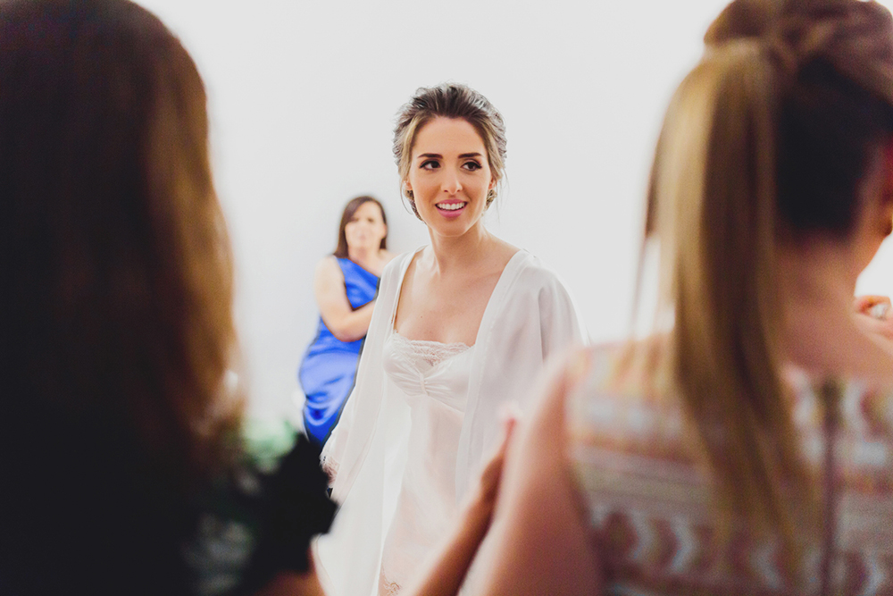 Santorini bride preparation with guests, family and friends